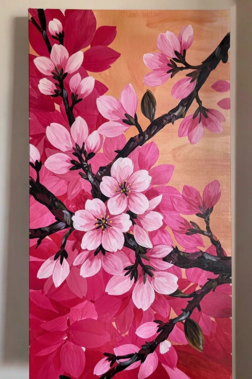 Vertical acrylic painting of pink cherry blossom flowers clustered on thin black branches against a blended orange background.