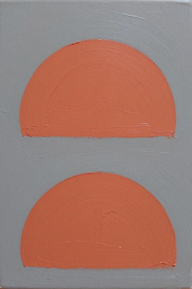 Abstract composition of two orange semicircles on a textured gray background.