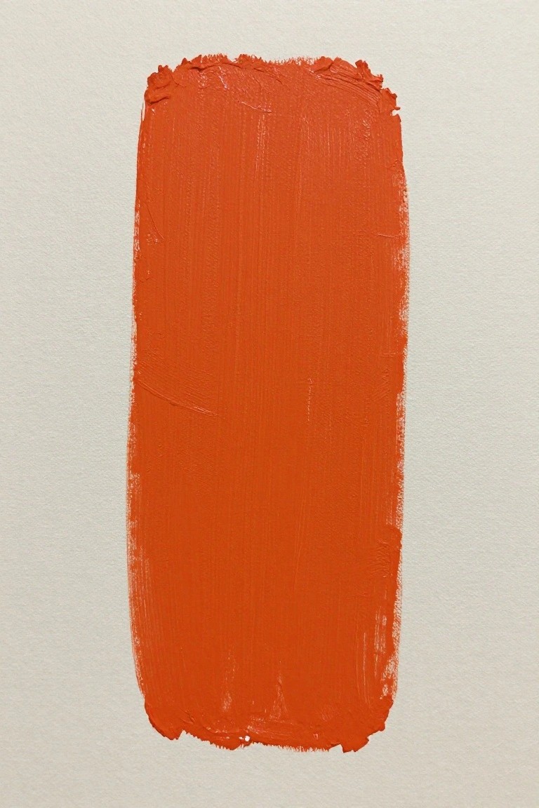 Vibrant orange paint rectangle with visible brushstrokes on white background