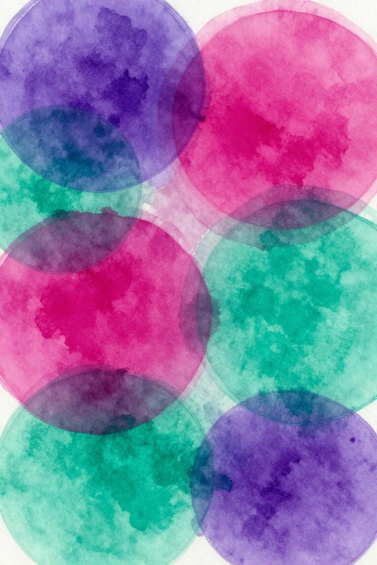 Overlapping translucent watercolor circles in purple, pink, green, and blue hues