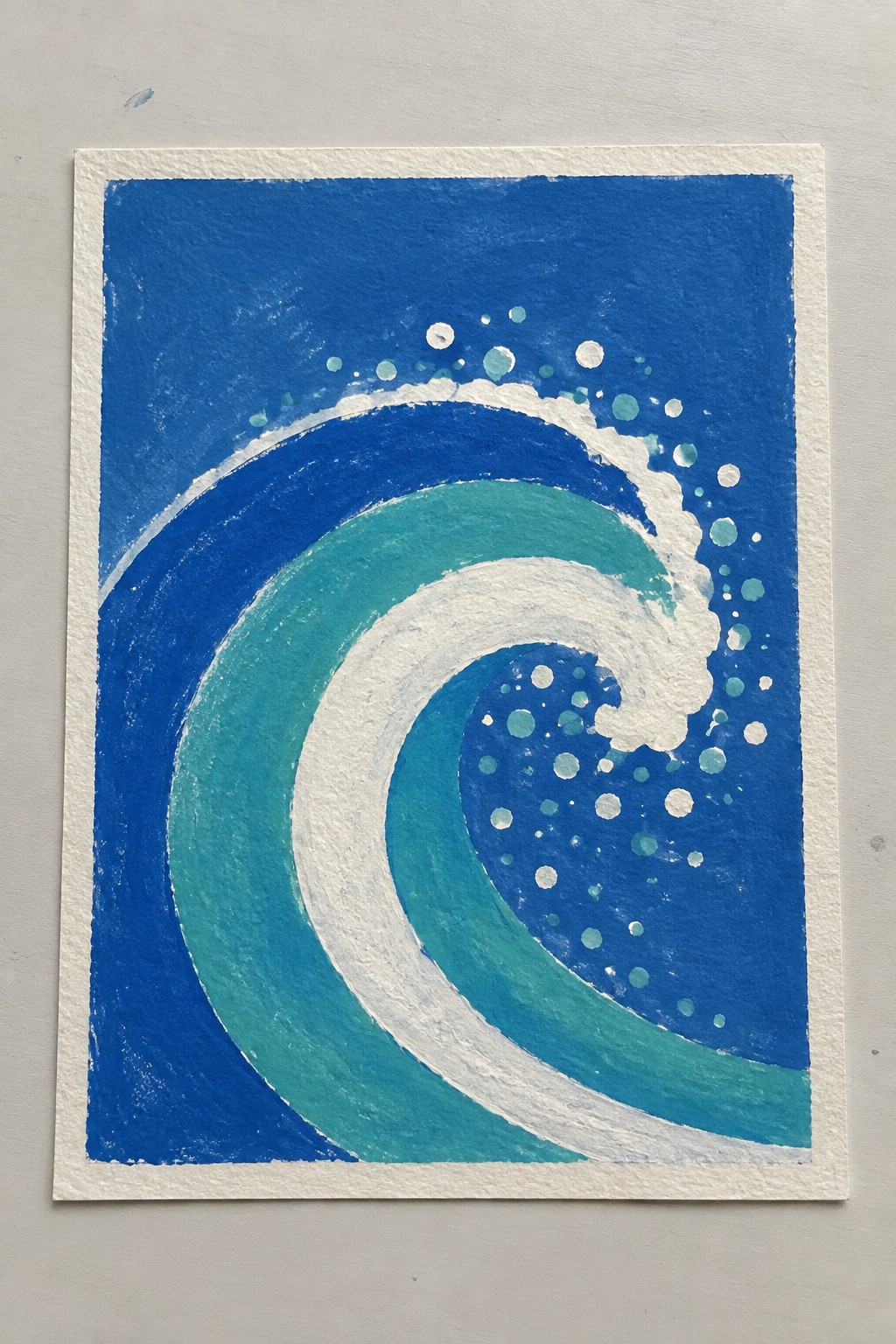 Blue and teal curling wave painting with white foam and bubbles.