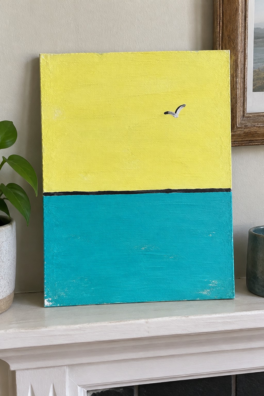 Minimalist painting with yellow sky, turquoise water, small white bird on mantelpiece