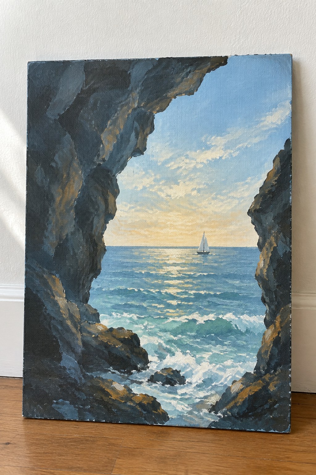 Realistic oil painting of sunset seascape with sailboat viewed through dark rocky cave opening