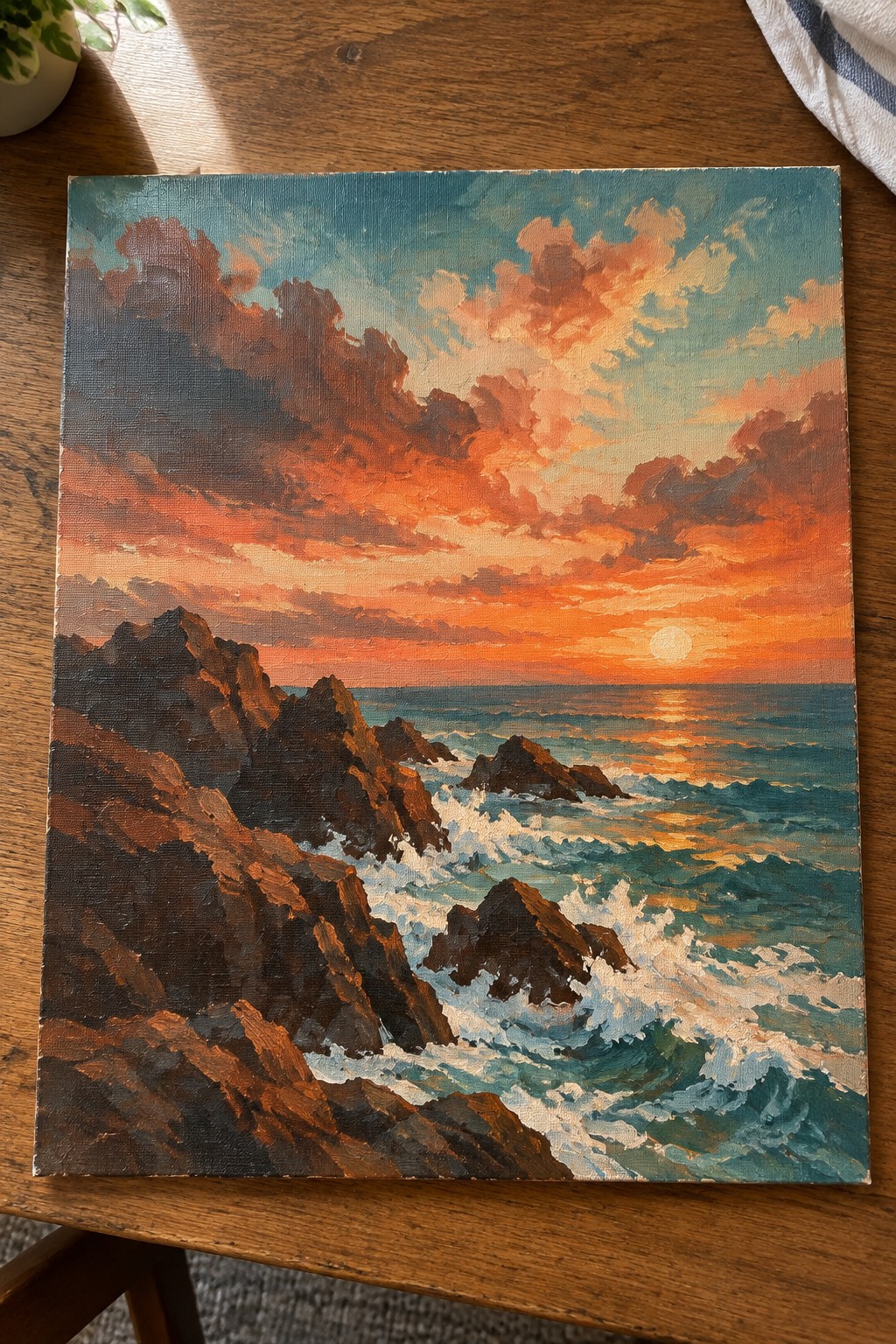Oil painting of vibrant orange sunset over rocky cliffs with crashing waves