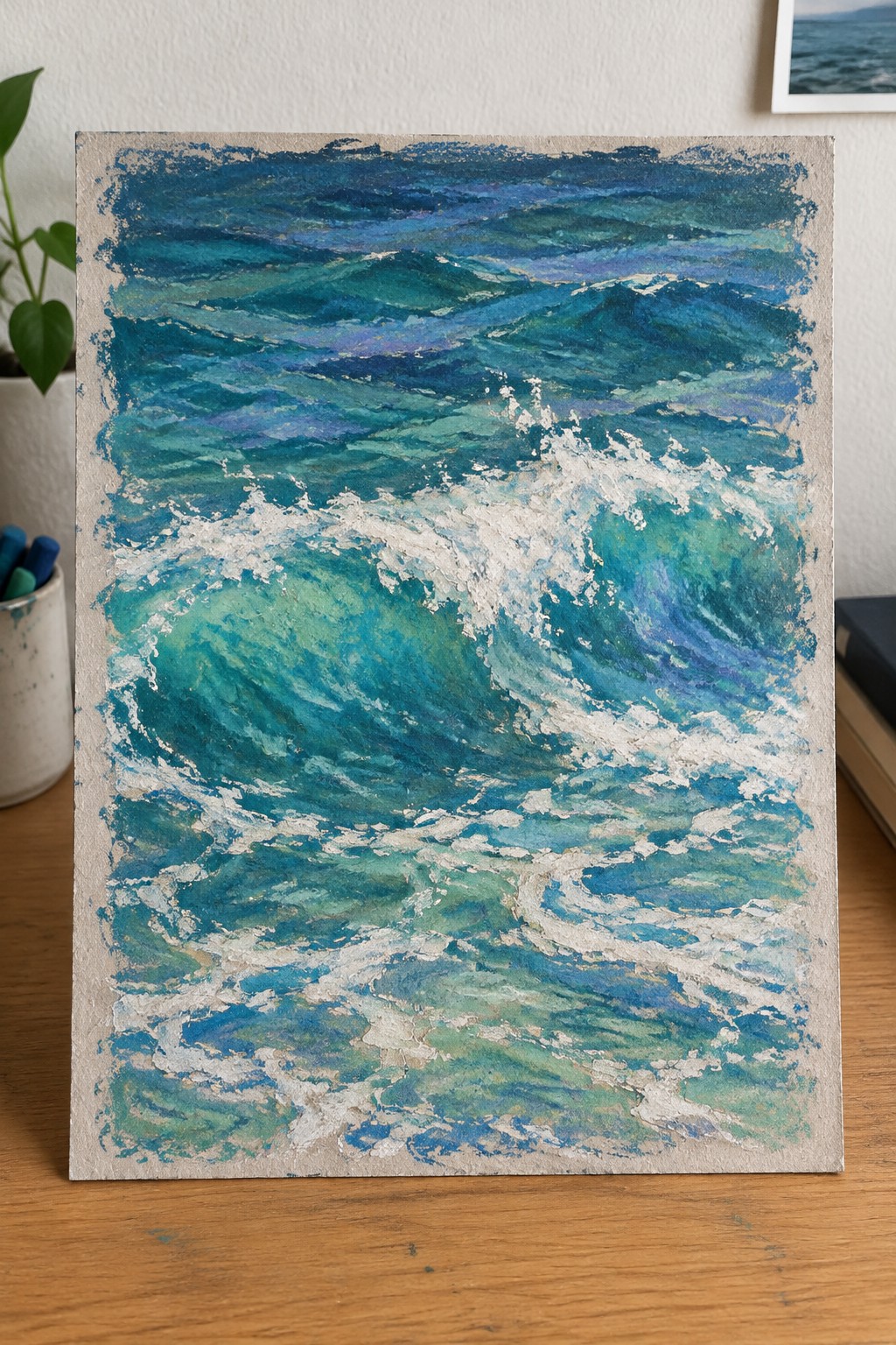 Expressive painting of crashing turquoise waves with white foam on canvas
