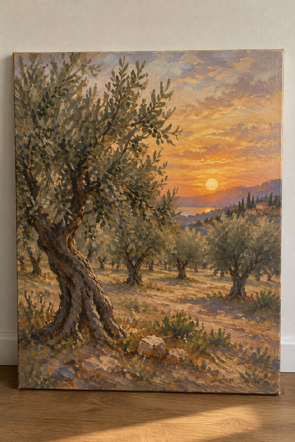 Sunset over gnarled olive trees in a golden Mediterranean grove landscape