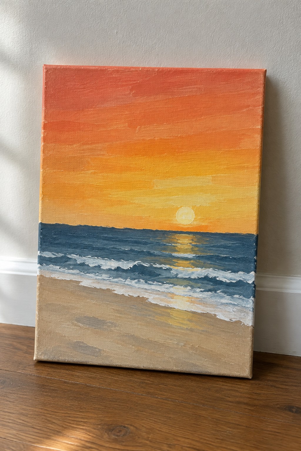 Seascape painting of sunset with orange sky, yellow sun, blue waves, and sandy beach