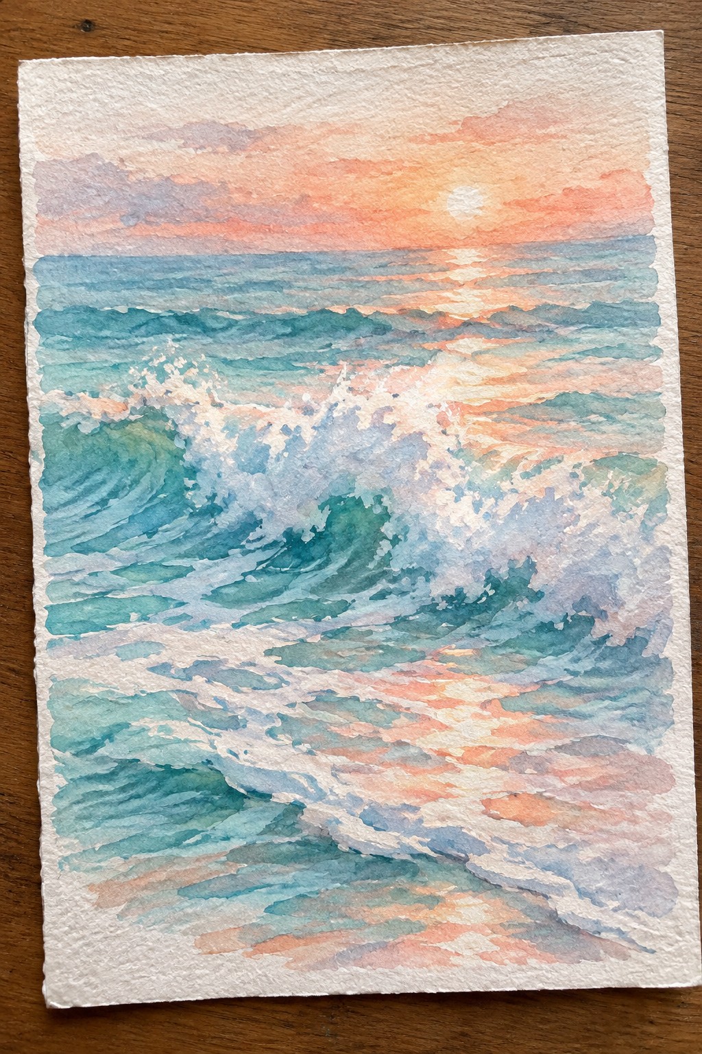 Watercolor painting of teal ocean waves with white foam under an orange and pink sunrise sky with a visible sun.