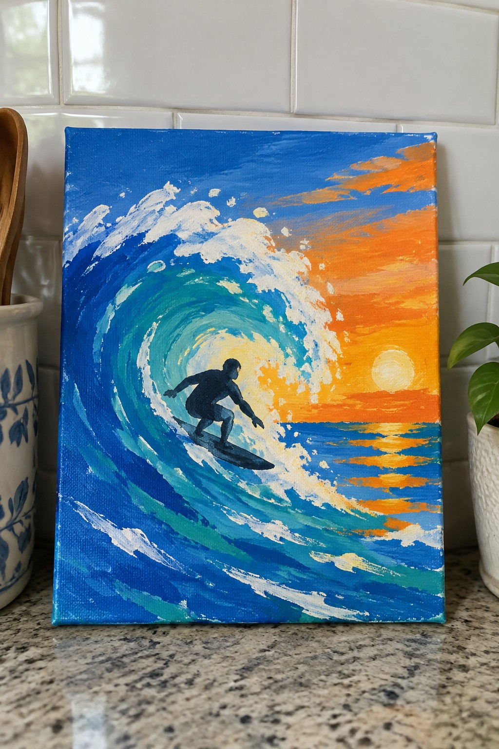 Acrylic painting of a surfer in black wetsuit riding a curling blue wave at sunset.