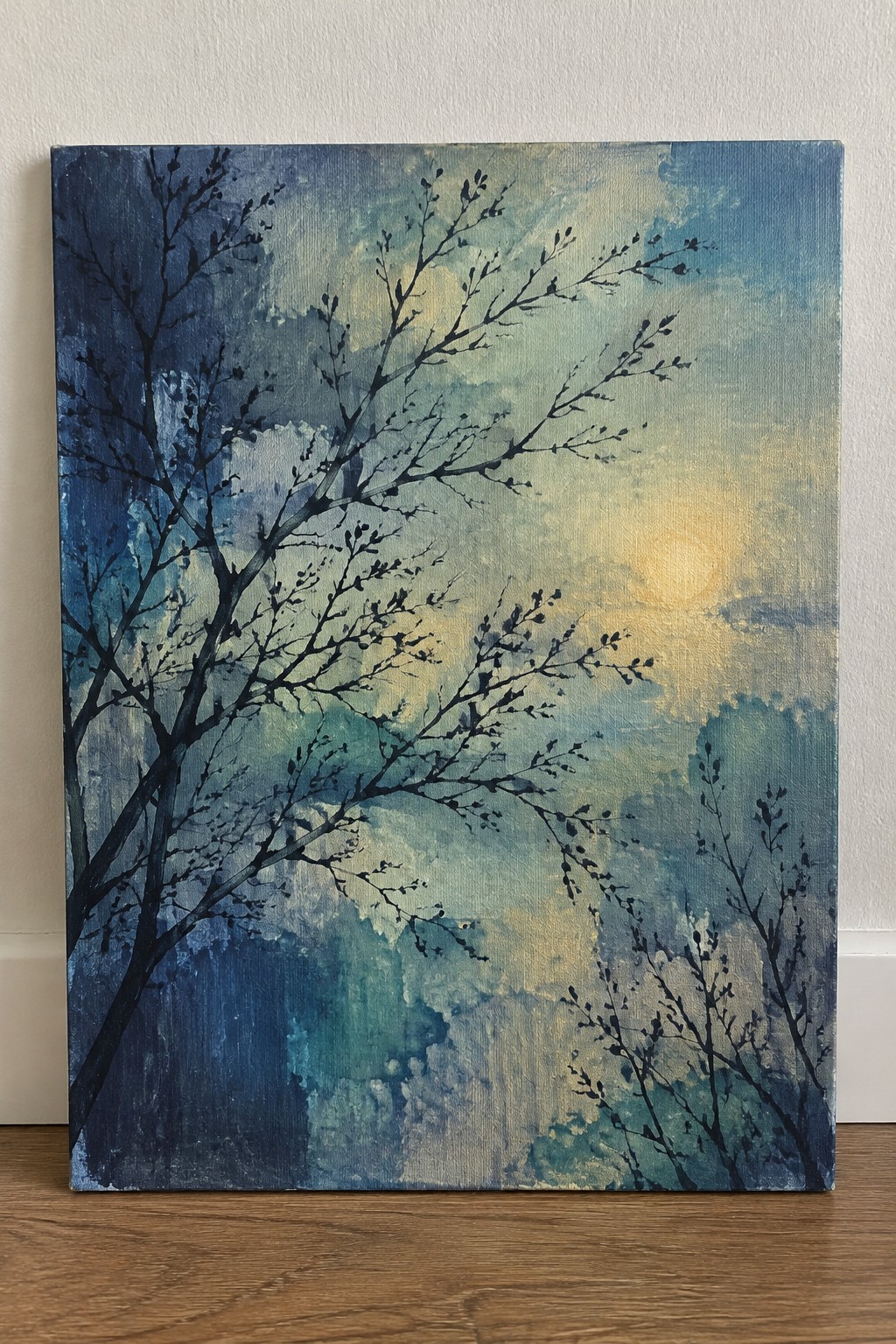 Abstract painting of dark tree branches against a misty blue and yellow sky.