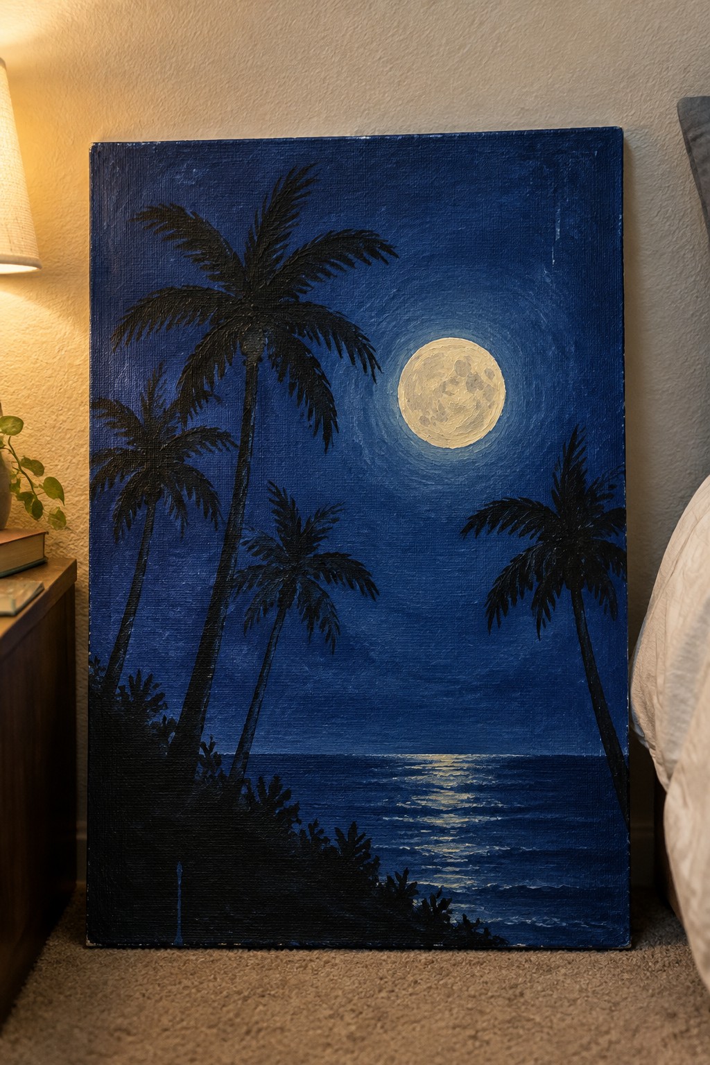 A painting of several black palm trees silhouetted against a dark blue night sky with a large full moon over water showing a thin light reflection.