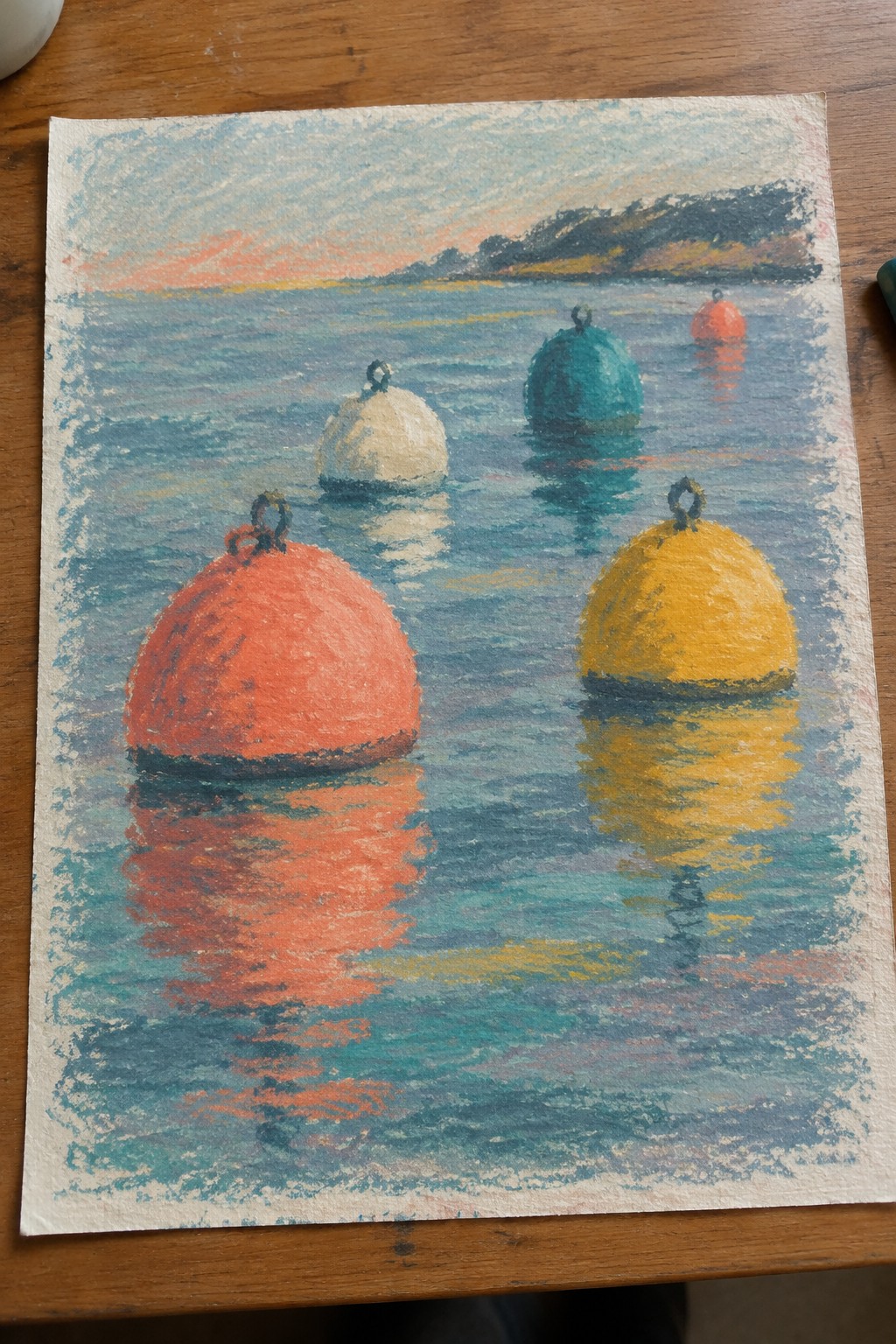 Pastel drawing of red, yellow, teal, and white buoys on reflective blue water at sunset.