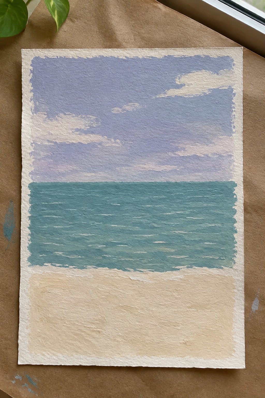Watercolor painting of purple sky, teal ocean waves, and sandy beach on textured paper.