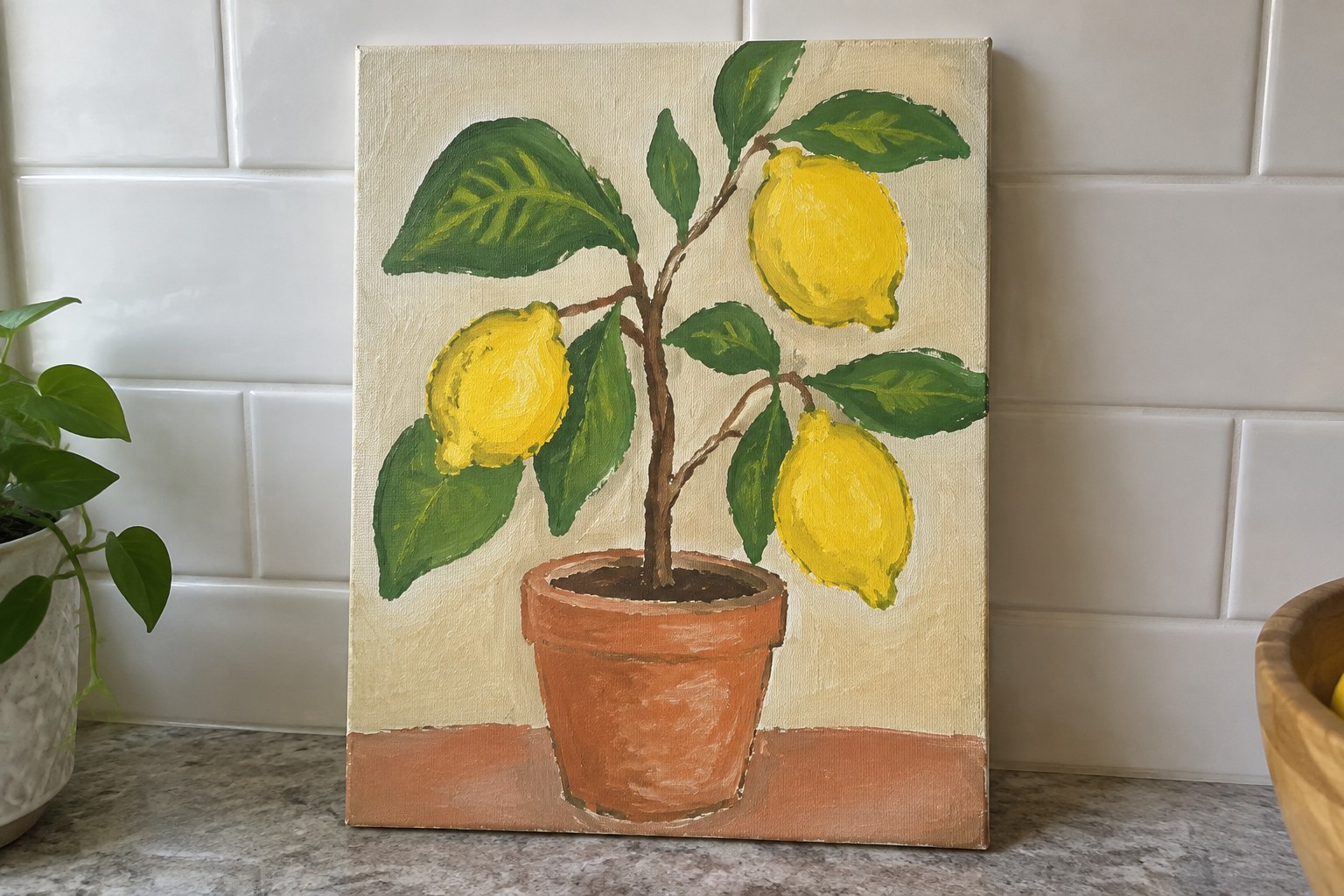 Canvas painting of lemon tree with yellow fruit in terracotta pot