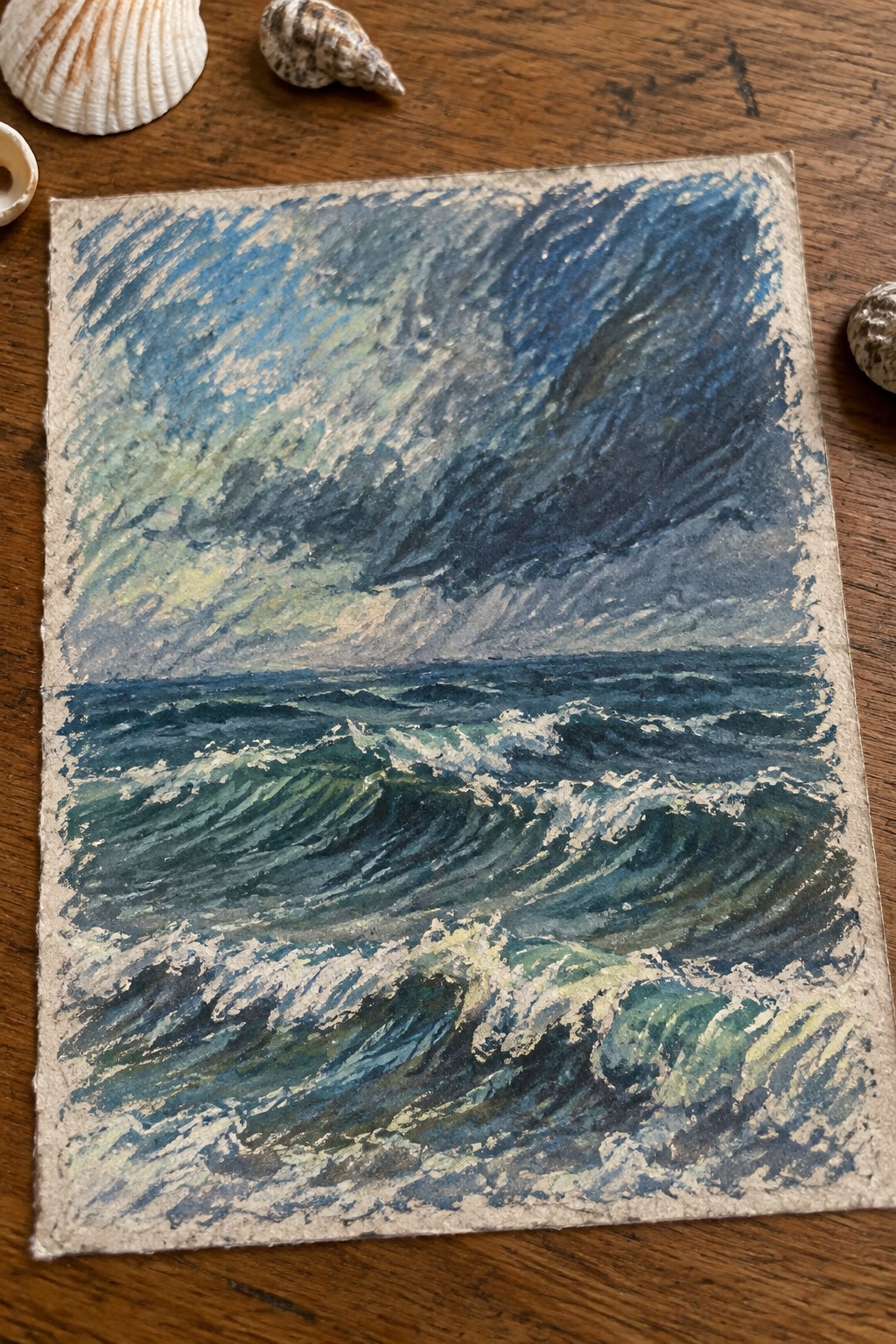 Watercolor of crashing blue-green waves under stormy sky, seashells on wooden table