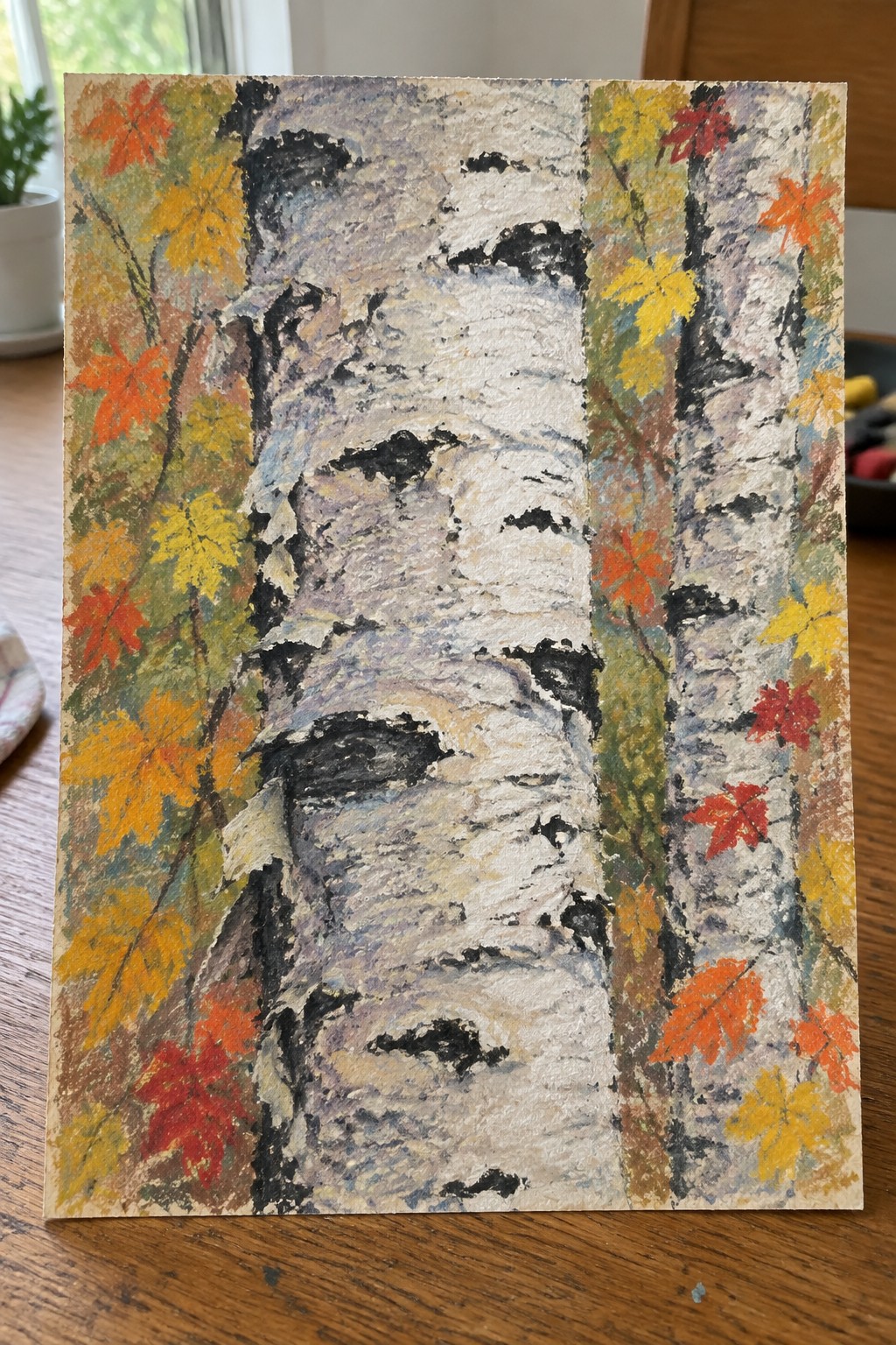 Textured painting of white birch trunks amid vibrant red, orange, and yellow autumn leaves.