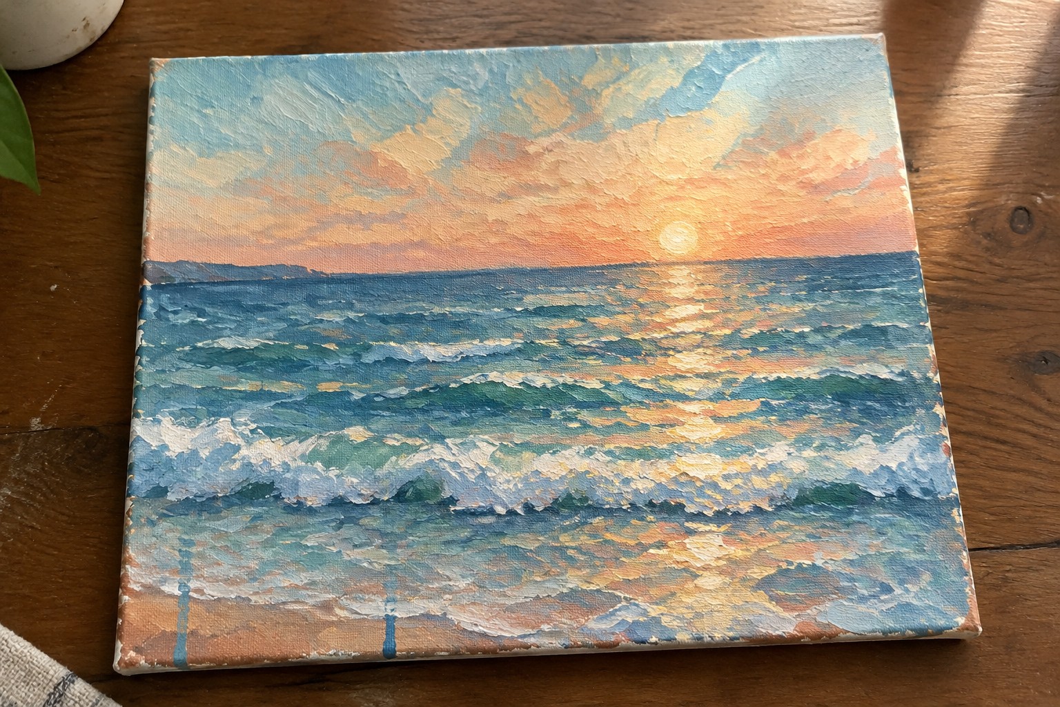 Impressionist canvas painting of ocean sunset with orange sun, pink clouds, and blue waves