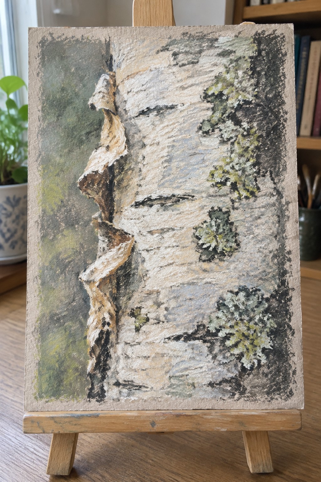 Impasto birch tree painting with peeling white bark on wooden easel