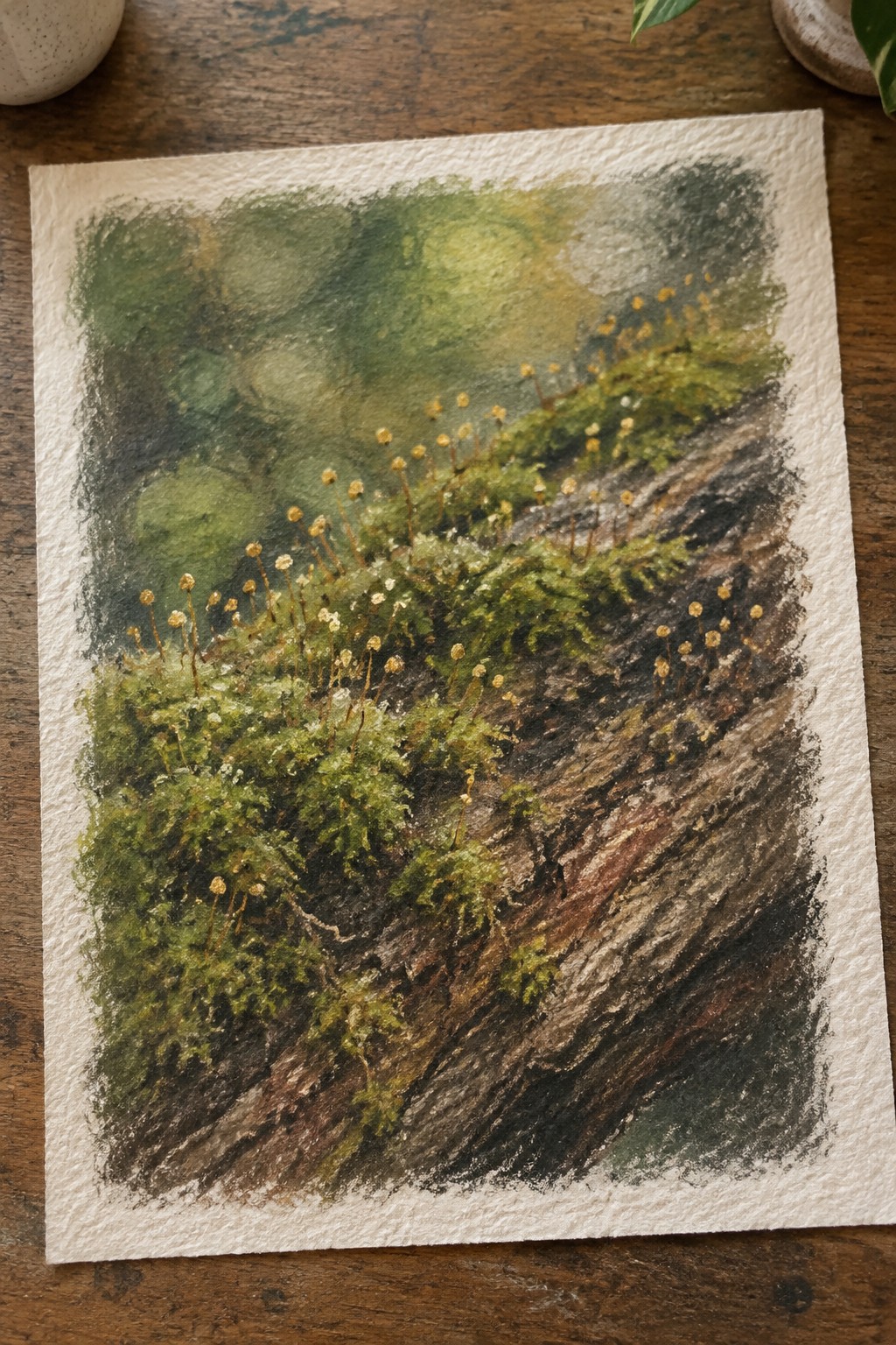 Watercolor of green moss with yellow buds growing on textured rocky slope