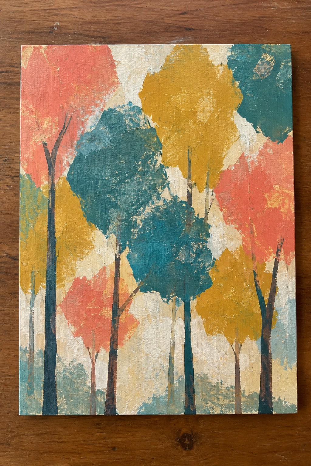 An acrylic painting of abstract trees with coral, yellow, and teal foliage shapes and dark trunks on a light textured background.
