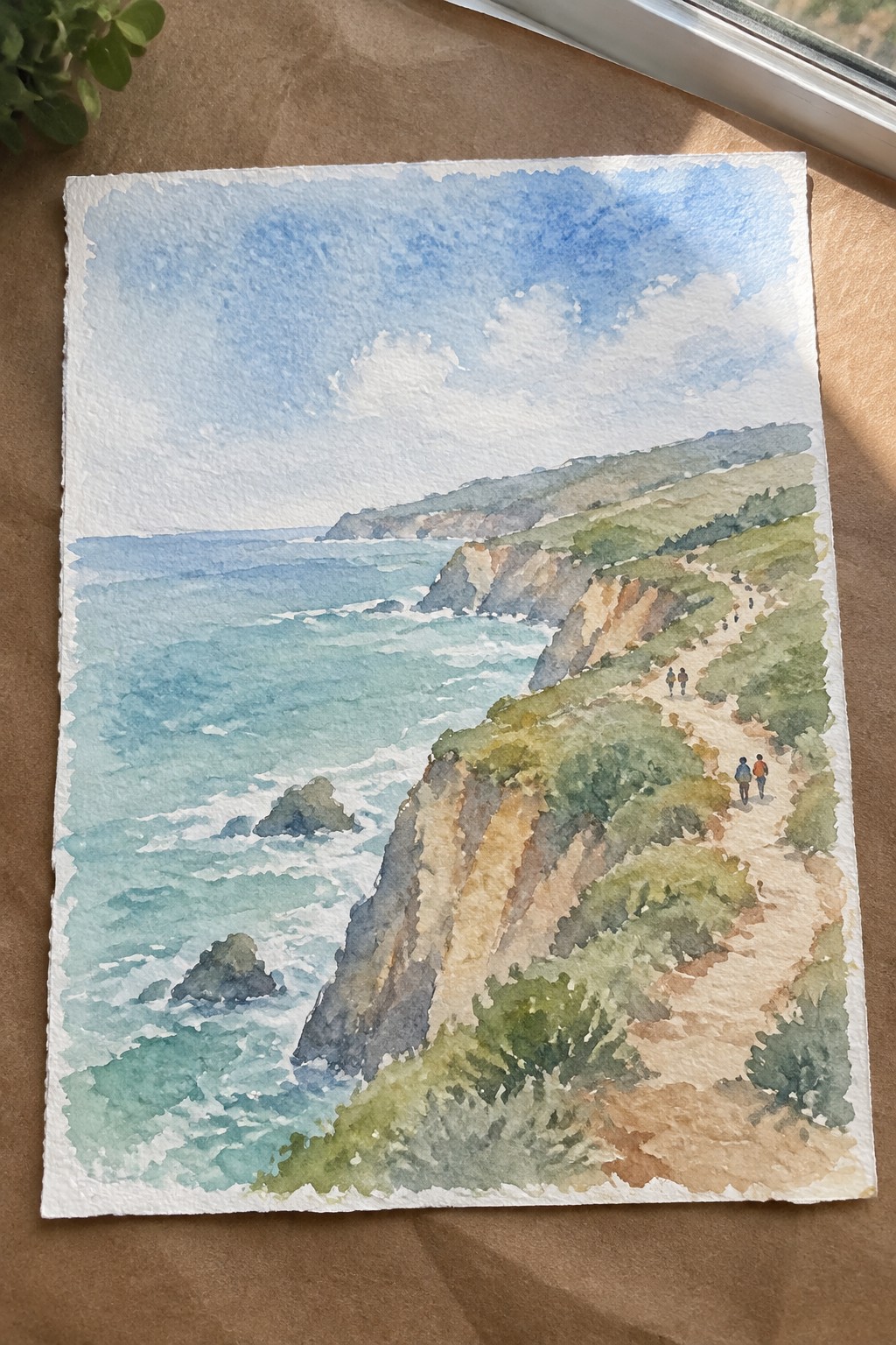Watercolor of coastal cliffs, turquoise waves, green hills, and hikers on a dirt path