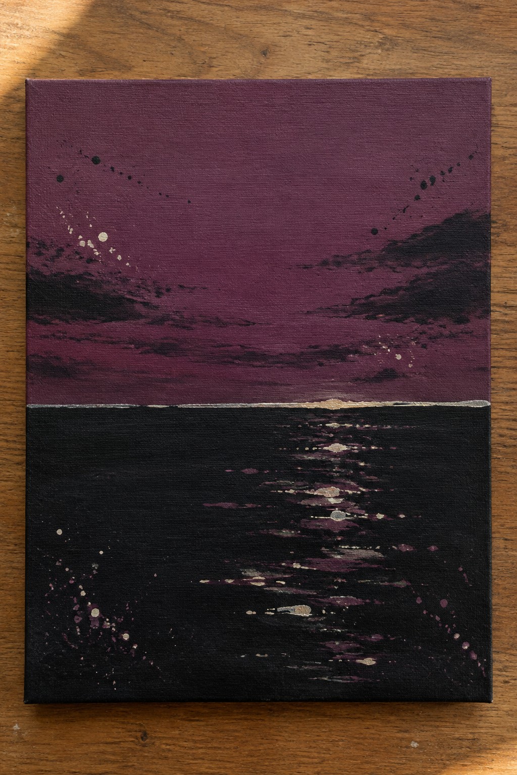 Abstract painting of purple starry sky above black reflective sea with golden horizon