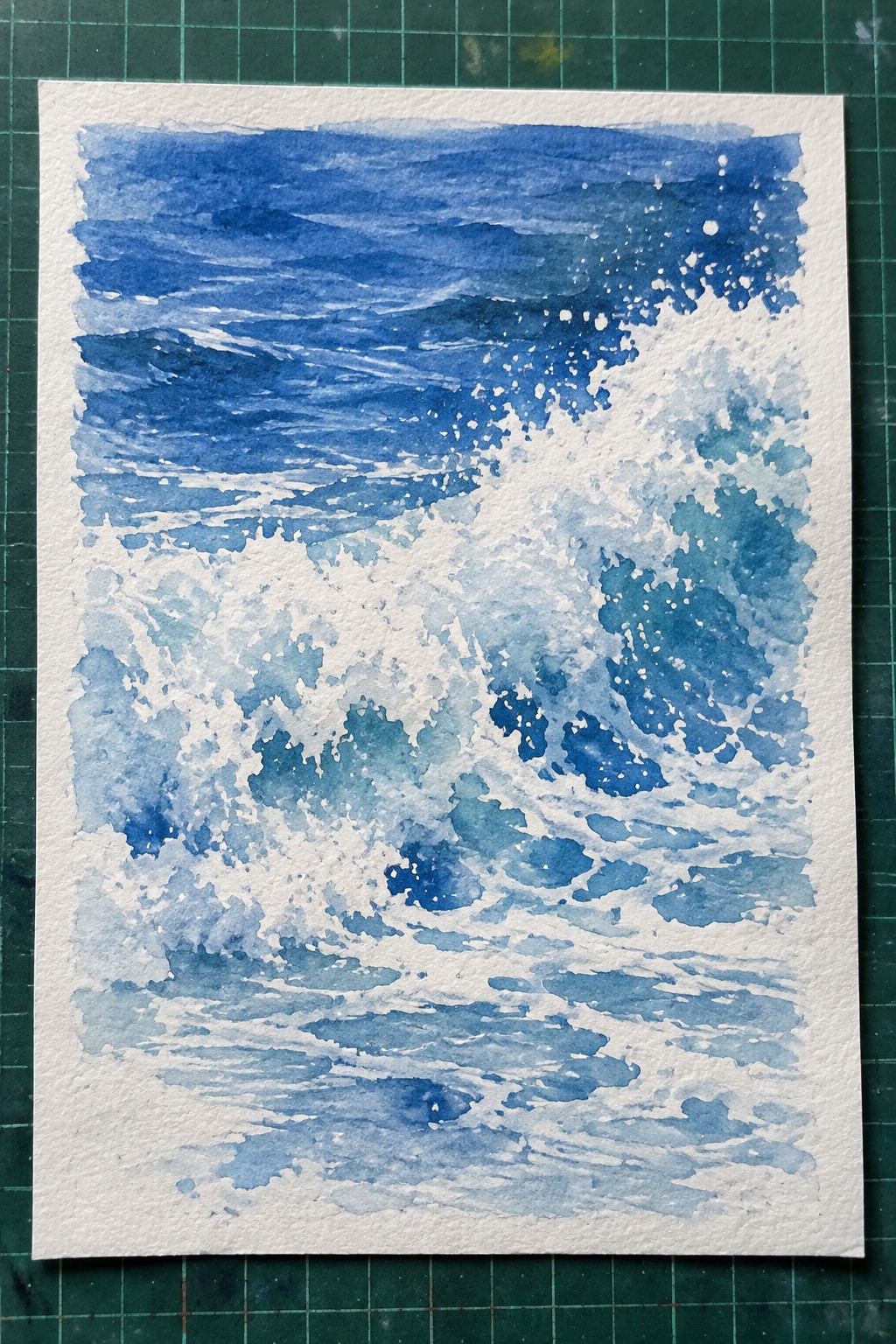 Watercolor painting of crashing blue ocean waves with white foam and splashes