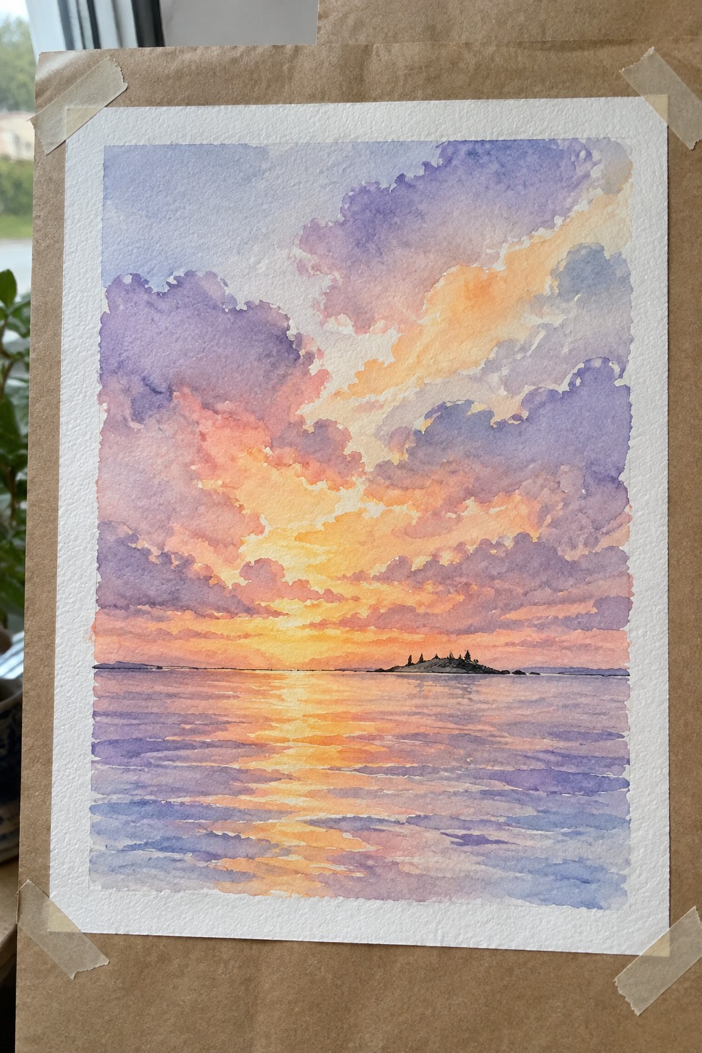 Watercolor sunset with vibrant purple-orange clouds reflecting on calm water and distant island.
