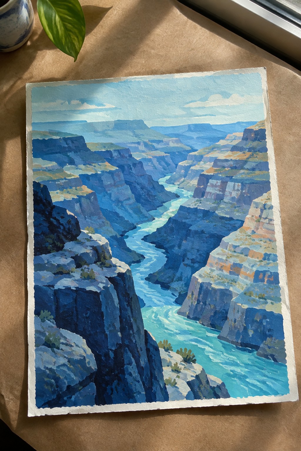 A painting of a blue canyon landscape with a turquoise river flowing between layered cliffs.